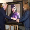 Lord Spencer Shaking hands with Fabian Perez next to Lady Spencer portrait by Fabian Perez