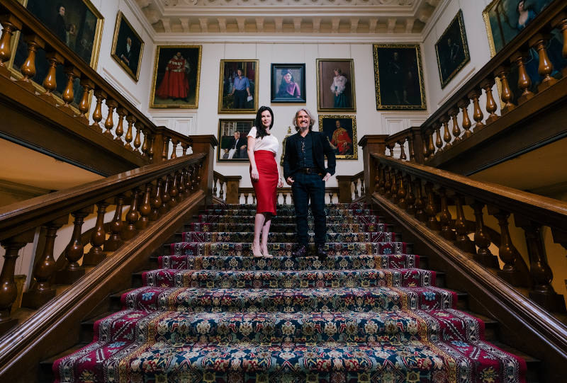 Lady Countess Spencer standing in front of portrait with Fabian Perez at Althorp House