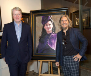 Lord Spencer standing in front of Lady Spencer portrait by Fabian Perez